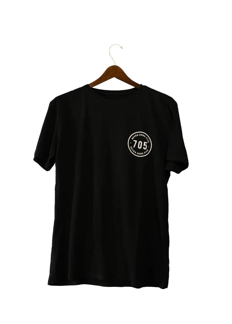 Black crew neck t-shirt on a hanger